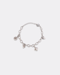 Silver charm link bracelet with heart and clover accents